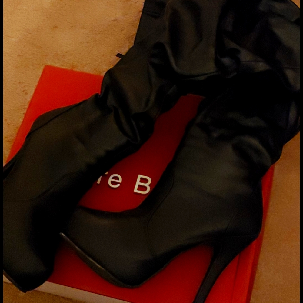 Thigh high heel boot